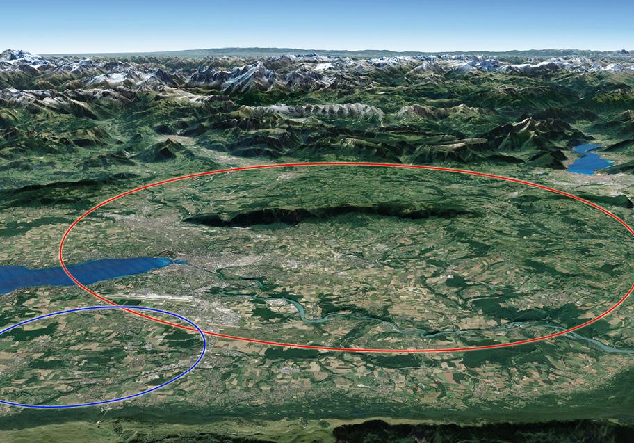 Laaja, vihreä maisema korkealta katsottuna. Horisontissa näkyy vuoristoa, lähempänä on alavampaa. Keskellä aluetta on suuri punaisella ympyrällä rajattu alue. Tämän alueen vieressä on pienempi sinisellä ympyrällä rajattu alue.
